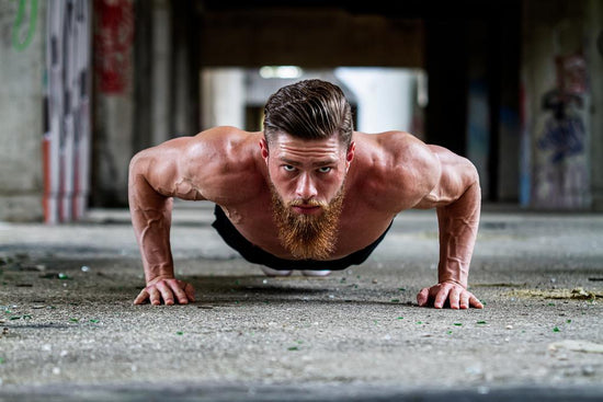 Press up challenge, man looks at camera while doing a press up, Fear Naught